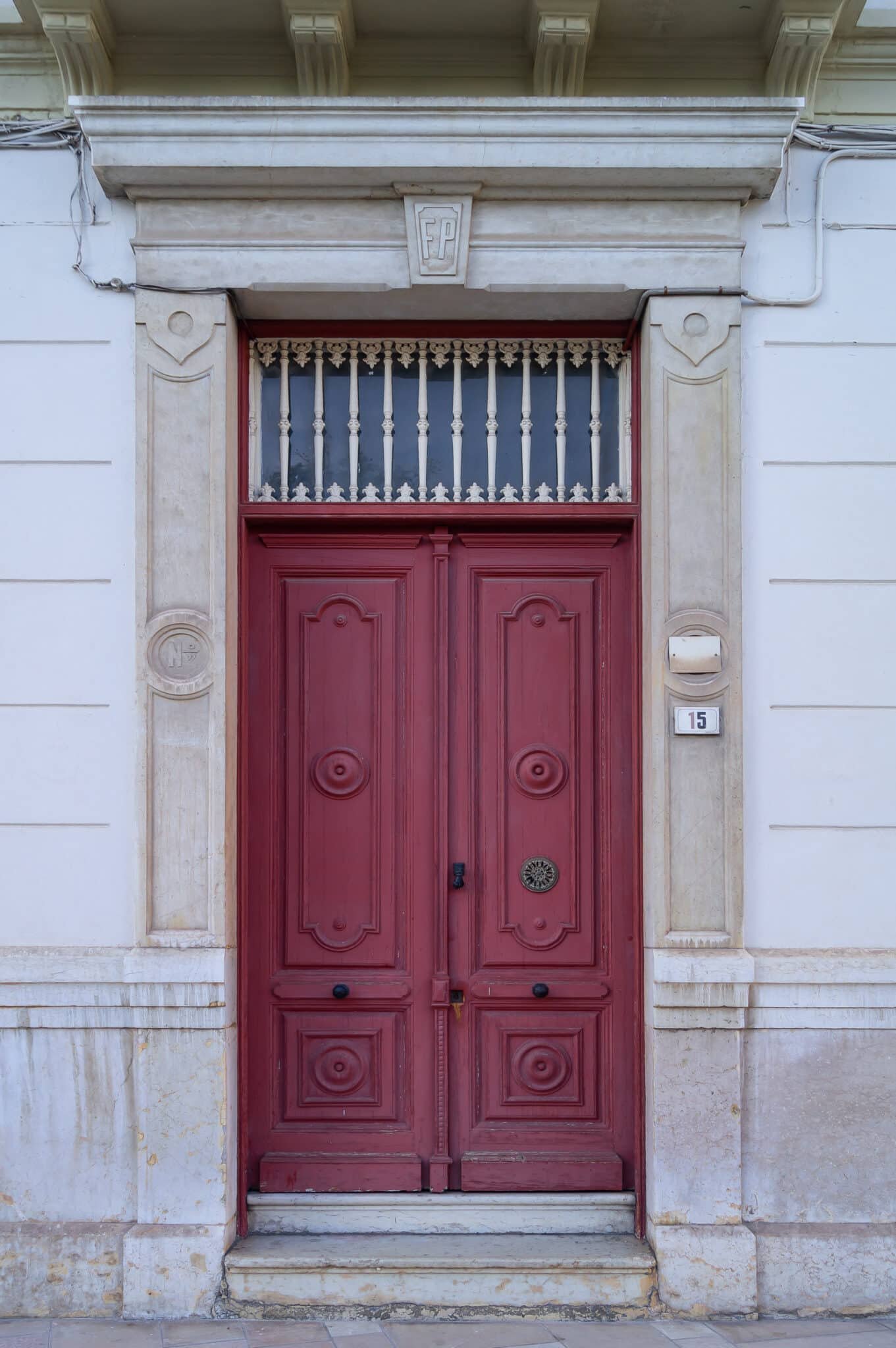 photo-antique-red-wooden-door-classic-building-scaled